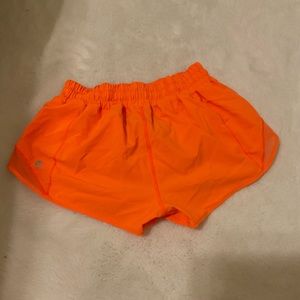 2.5 inch hotty hot shorts the color is highlighter orange